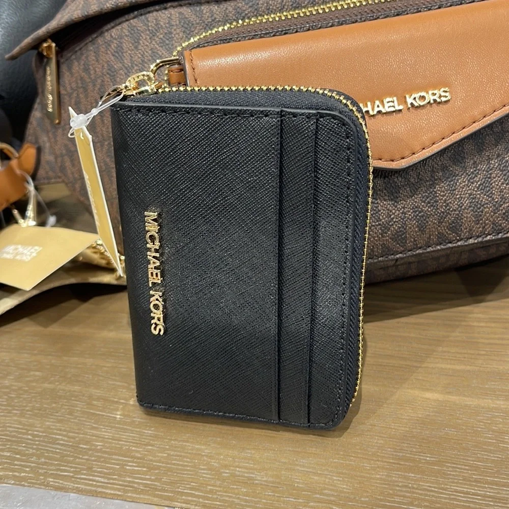 Michael Kors Jet Set Travel Medium Zip Around Card Case
Color: Black
NWT - Picture 9 of 16